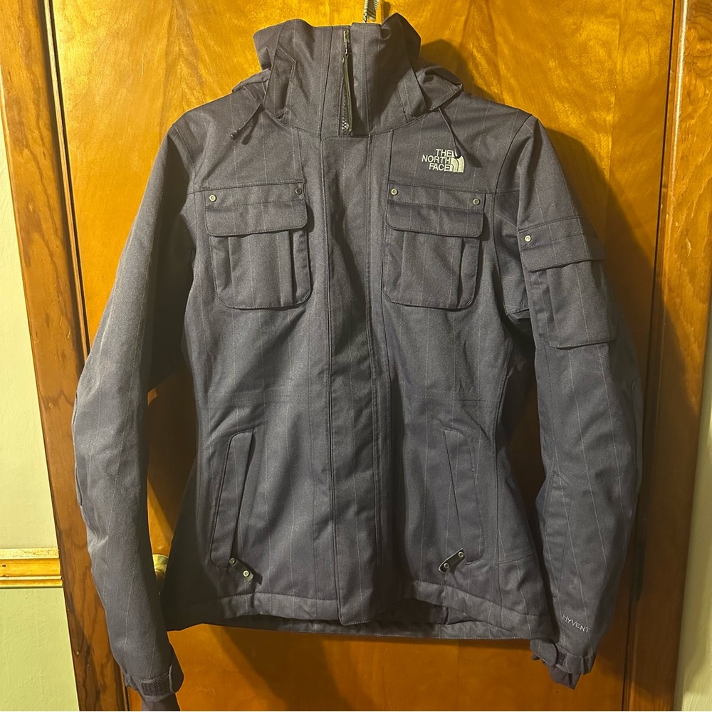 The North Face women’s HyVent Ski jacket purple with gold pinstripe